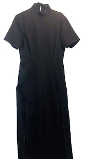 a women's black dress on a hanger