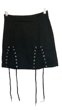 a black skirt with lace ups on it